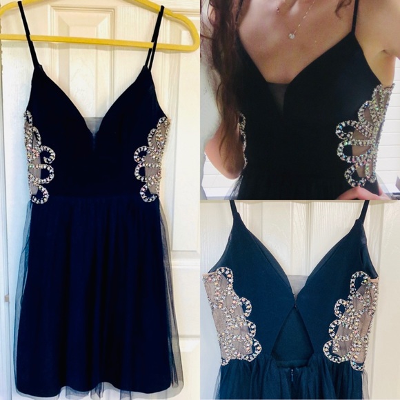 Blondie Nites Dresses & Skirts - Blondie Nites spaghetti strap short dark blue dress sheer bedazzles cutout back